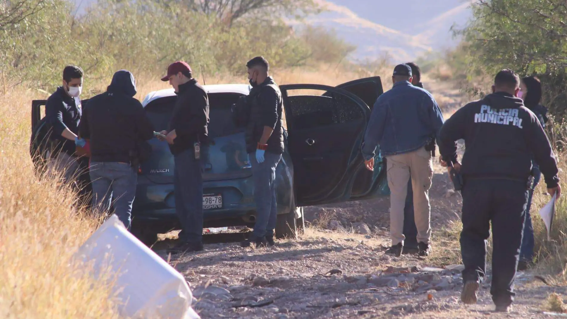 hombres muertos y un herido